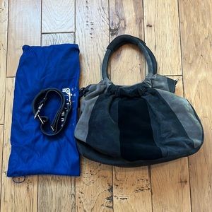 Suede purse by Stuart Weitzman